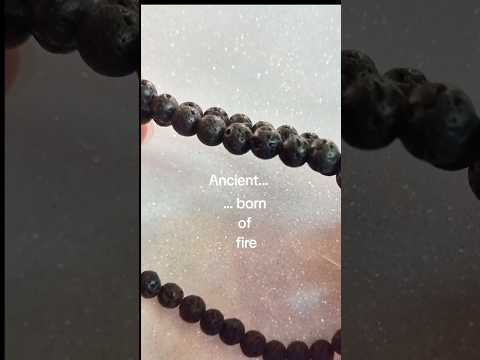 A short-form video showcase demonstrating the unique porous texture and elegant daily wear movement of a 6mm volcanic lava rock necklace.
